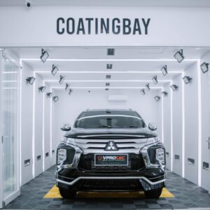 Sleek SUV in professional automotive coating facility
