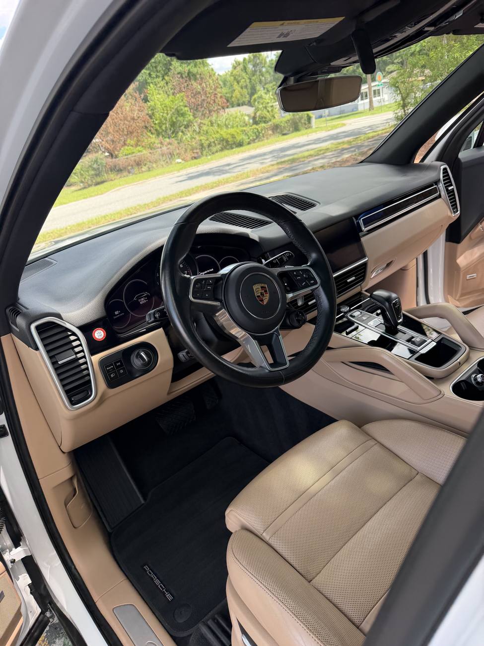 Porsche Cayenne dashboard and steering wheel after detail Orlando FL