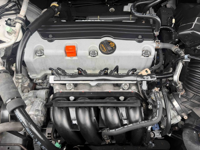Car engine bay in Orlando after cleaning