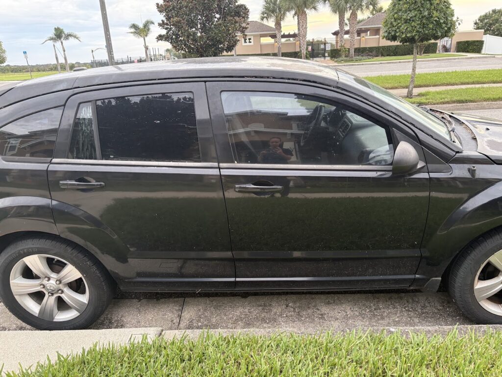 A 2010 Dodge Caliber parked after its detail
