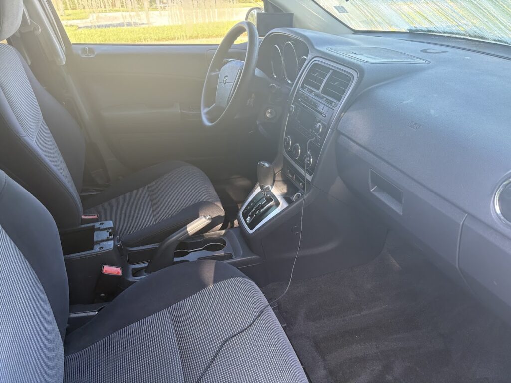 Front interior of a 2010 Dodge Caliber after detailing